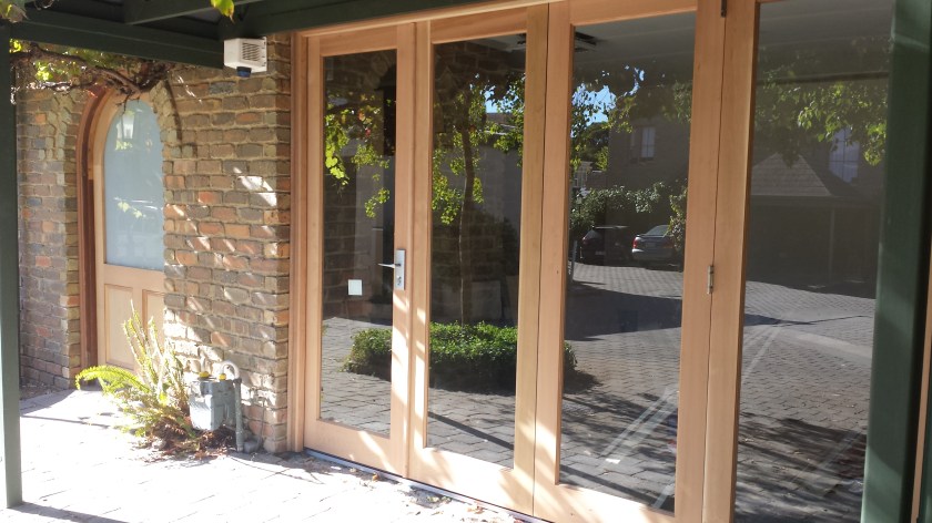 4 panel WRC bifold door + arched front door.