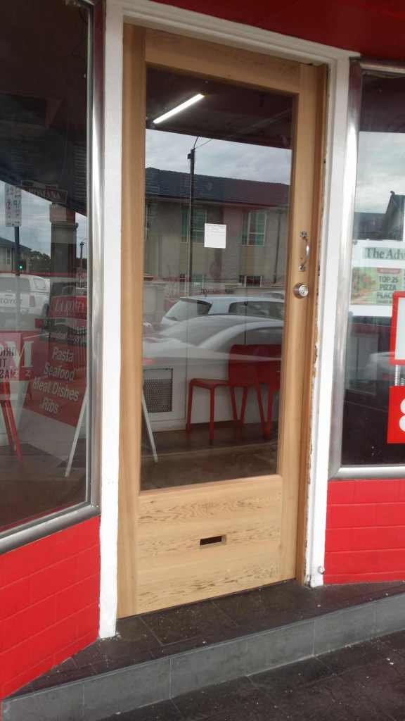 Cedar door with letterbox cutout. Shopfront door. 