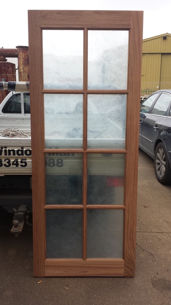 Door made out of Blackwood and rice paper laminate safety grade glass.