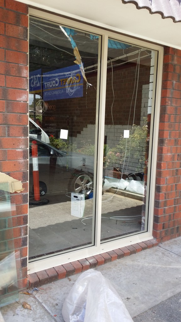 shop front. commercial aluminium fixed lites in paperbark powdercoat