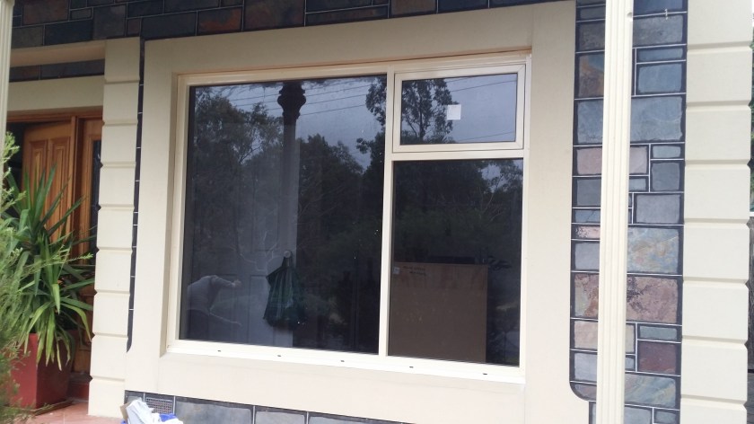 primrose comm alum window with grey lam and awning